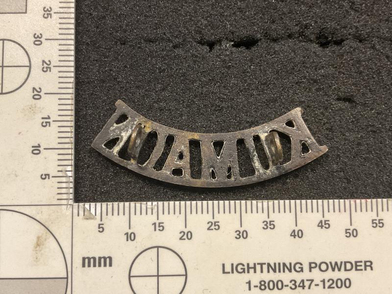 Indian Army, KUMAON Regiment black brass shoulder title.