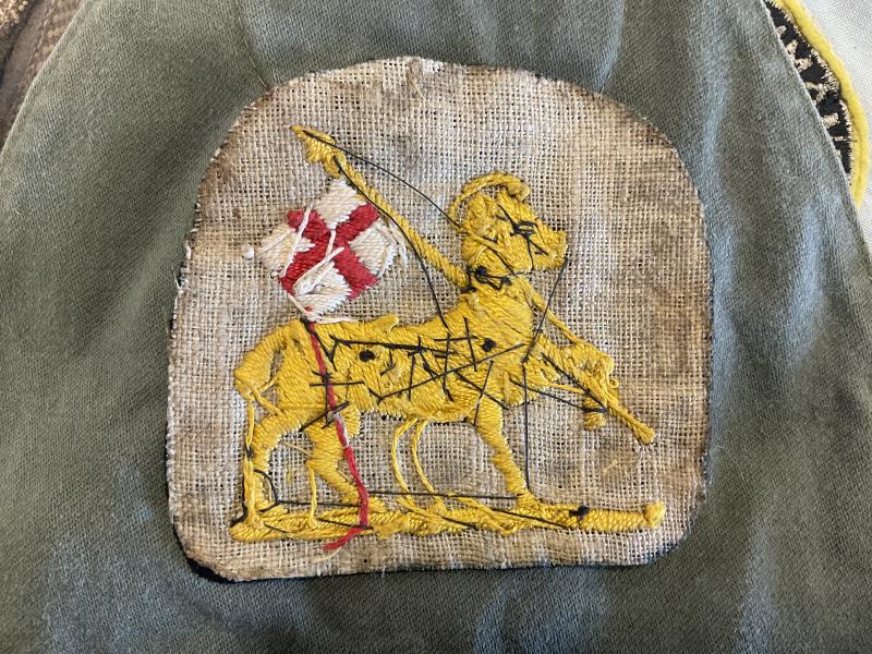 Queens Regiment blazer badge.