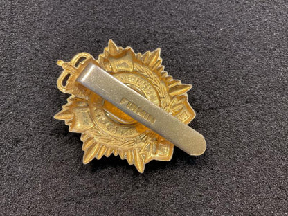 Royal Logisics Corps (RLC) bi-metal cap badge.