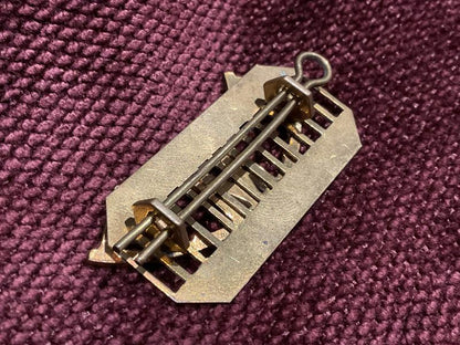 Royal Malta Artillery (R.M.A) brass shoulder title