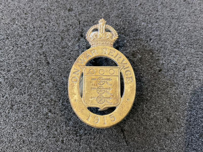 Gradia Militaria -  On War Service 1915 brass button hole lapel badge.