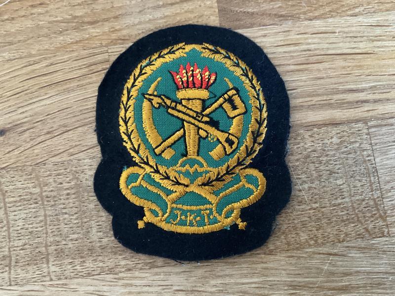 Gradia Militaria -  Tanzania J.K.T (National Army) Officers hat badge.