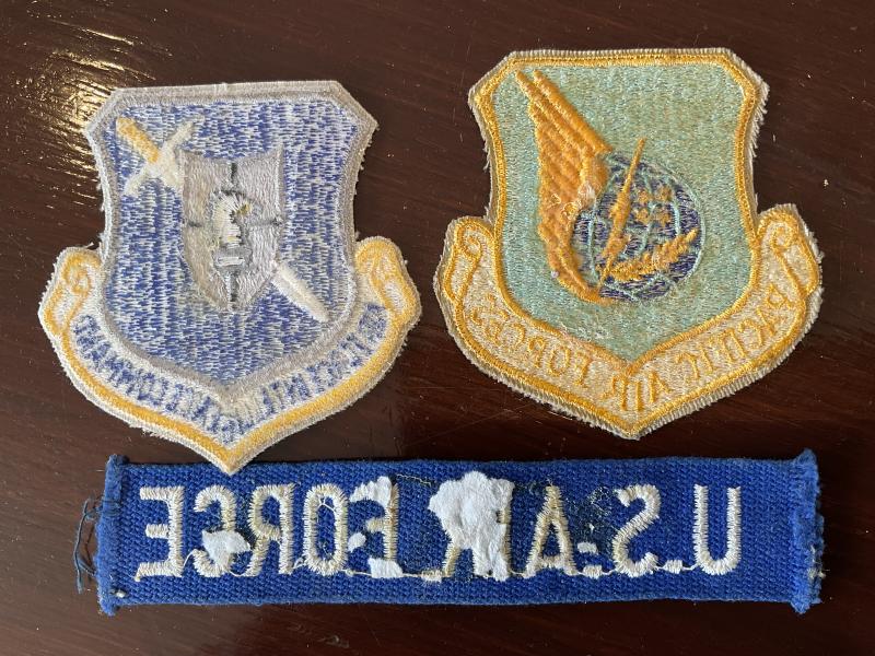 U.S.Air Force Intelligence Command & Pacific Air Forces insignia.
