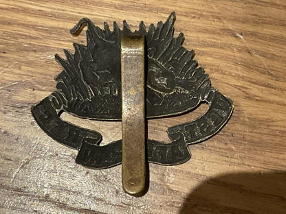 WW2 East African Regiment dark bronzed cap badge