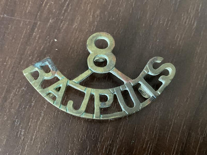 Gradia Militaria -  WW1 Indian Army 8th Pajputs Regt brass shoulder title.
