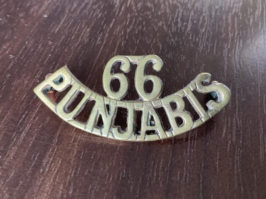 Gradia Militaria -  WW1 Indian Army 66th Pajputs Regt brass shoulder title.