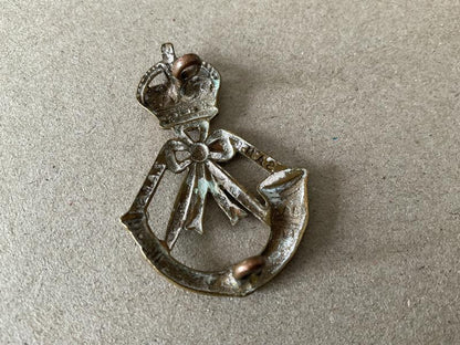 South African Mounted Rifles (S.A.M.R) cap badge.