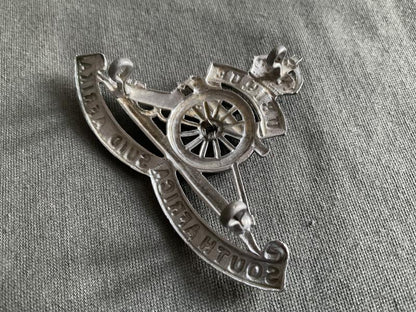 K/C South African Artillery chromed cap badge.