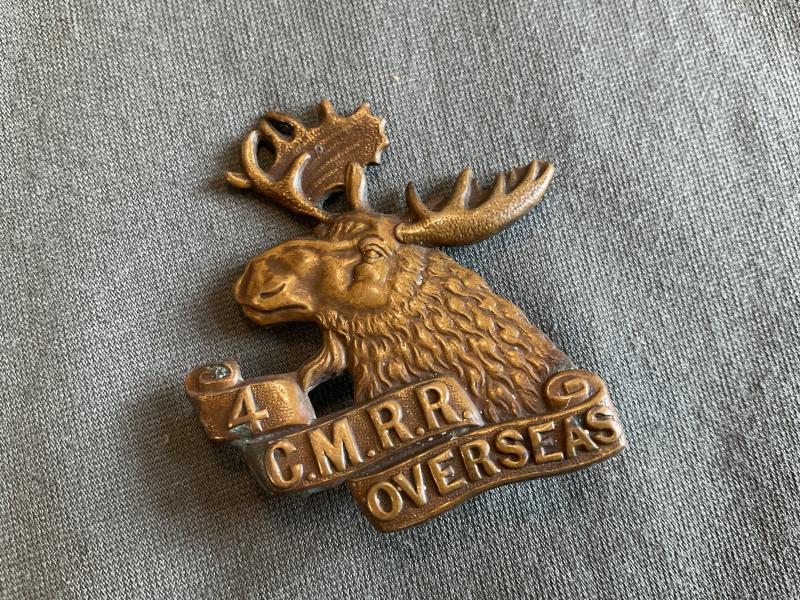 Gradia Militaria -  WW1 C.E.F 4th Canadian Mounted Rifle Battalion cap badge.