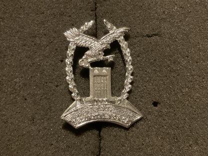 Gradia Militaria -  Sierra Leone National Diamond Mine Security Force cap badge.