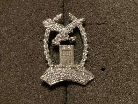 Gradia Militaria -  Sierra Leone National Diamond Mine Security Force cap badge.