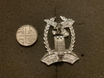 Sierra Leone National Diamond Mine Security Force cap badge.