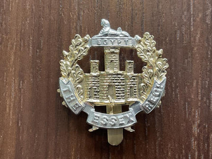Gradia Militaria -  Anodised Essex Regiment cap badge by Firmin.