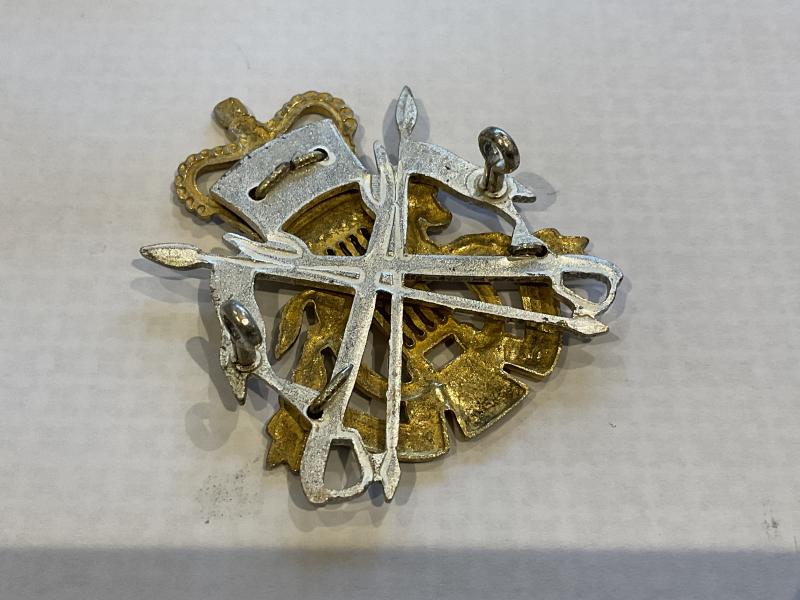 British Army Light Cavalry Band cap badge.