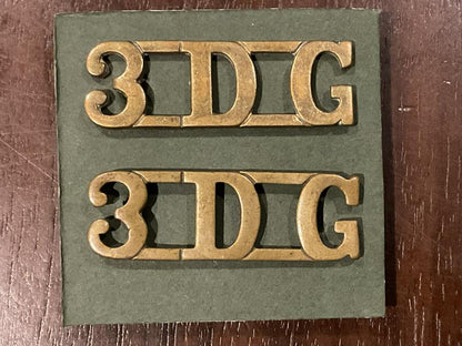 Gradia Militaria -  WW1 3rd Dragoon Guards (3 D.G.) brass shoulder titles