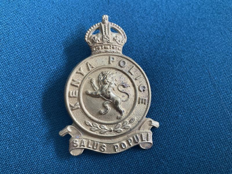 Gradia Militaria -  K/C Kenya Police 1st issue non-voided brass cap badge