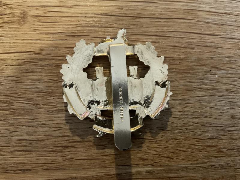 Anodised Essex Regiment cap badge by Firmin London