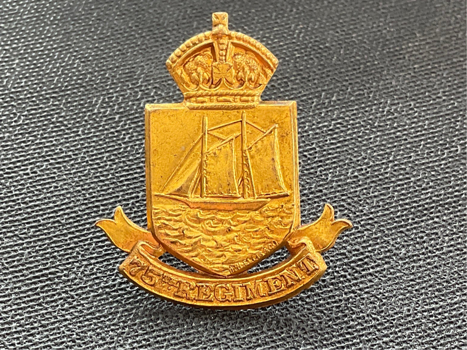 Gradia Militaria -  Canadian 75th Lunenburg Regt 1910 issue cap badge.