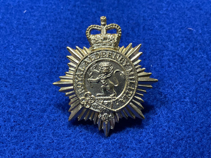 Anodised Royal Alderney Militia cap badge front