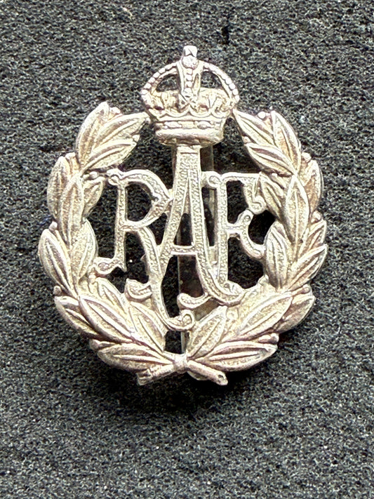 Post 1918 RAF band or police white metal cap badge with rear slider.