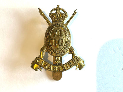 WW1 The 6th Dragoon Guards ( Carabiniers ) brass economy cap badge.