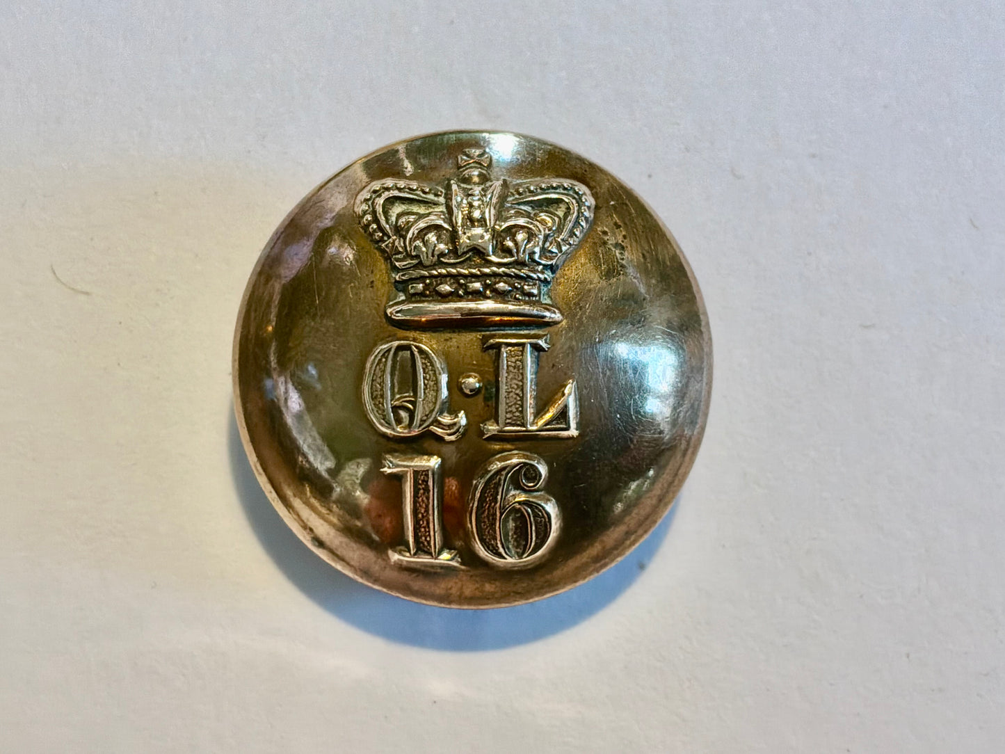 Q.V.C 16th The Queens Lancers large 25mm button by rare maker, worn circa 1861-1902.