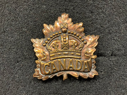1914 dated Canadian General Service cap badge by ELLIS