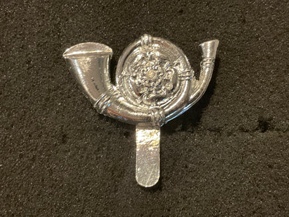 The Kings Own Yorkshire Light Infantry anodised cap badge.