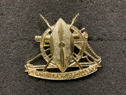 Anodised Kenya Army Artillery cap badge.