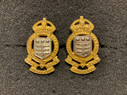 Pre 1952 R.A.O.C officers silver & gilt collar badges.