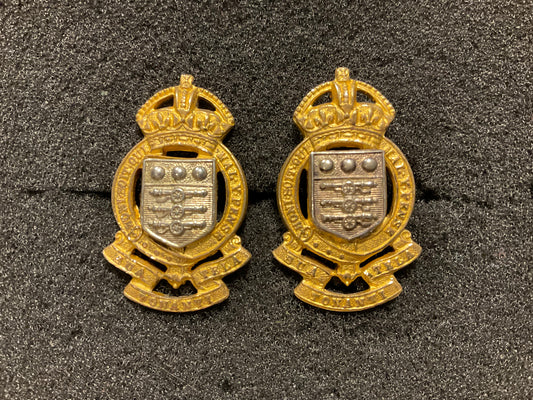 Pre 1952 R.A.O.C officers silver & gilt collar badges.