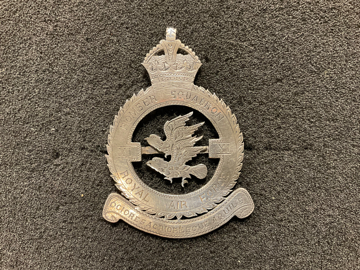 WW2 RAF No11 Bomber Squadron silver head dress badge ?
