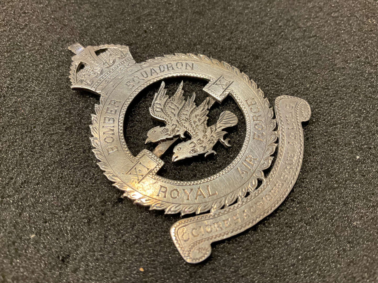 WW2 RAF No11 Bomber Squadron silver head dress badge ?