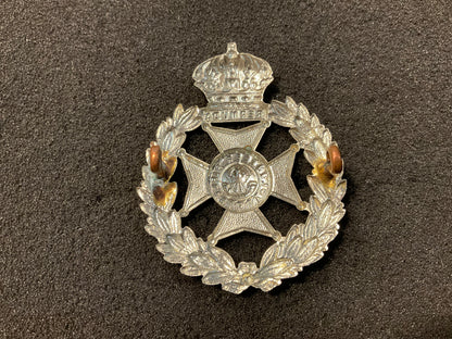 Bermuda Volunteers cap badge.