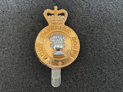 Anodised Army Catering Corps cap badge by Grove MFG B’HAM with steel riveted slider.