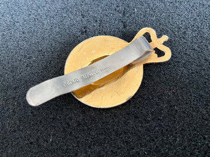 Anodised Army Catering Corps cap badge by Grove MFG B’HAM with steel riveted slider.