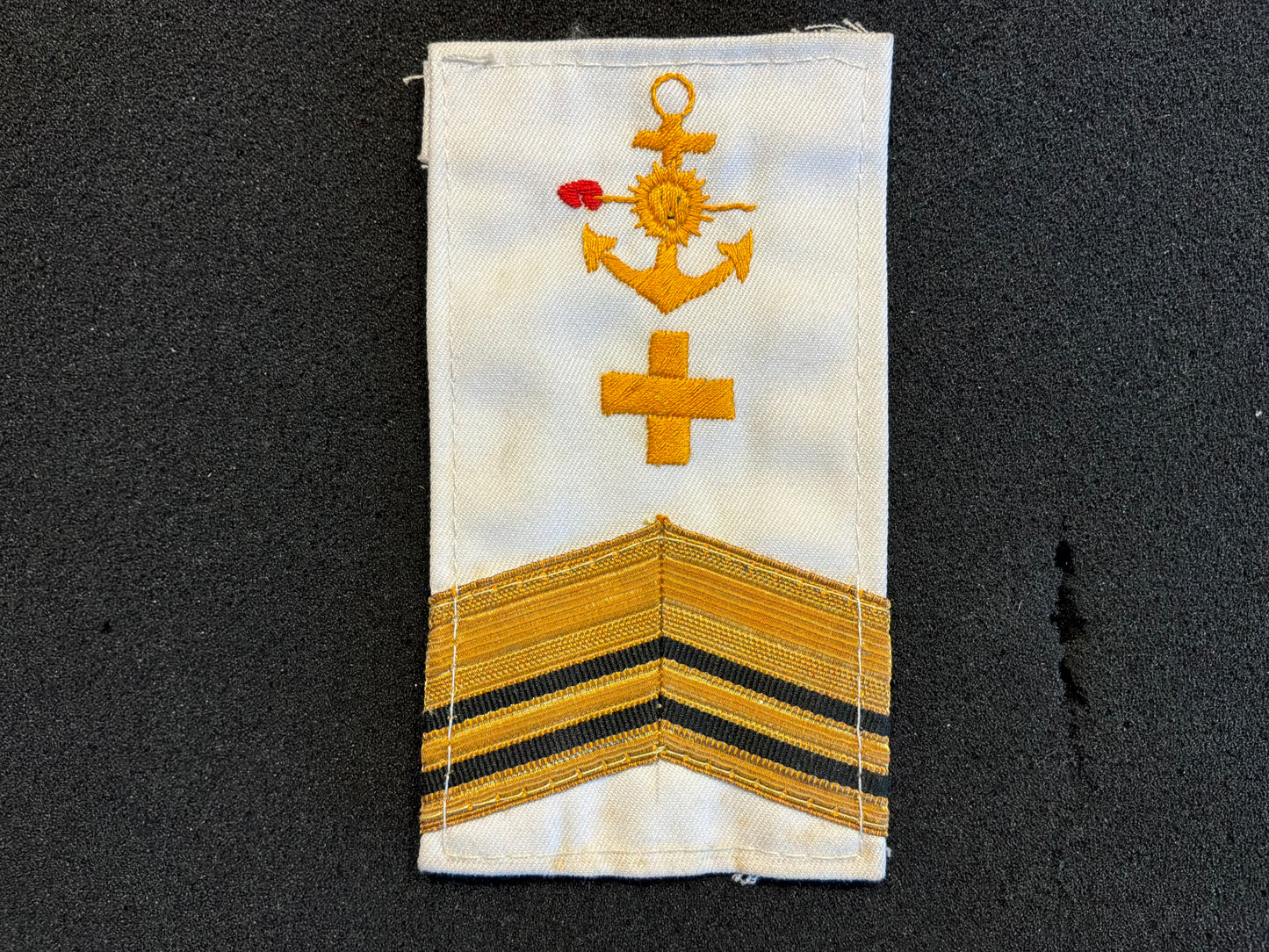 White tropical dress Argentine Navy officer rank badge