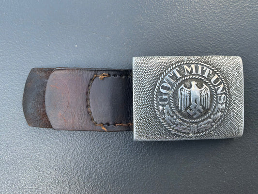 WW2 German Army (Heer) enlisted man’s and NCO’s belt buckle & leather tab.