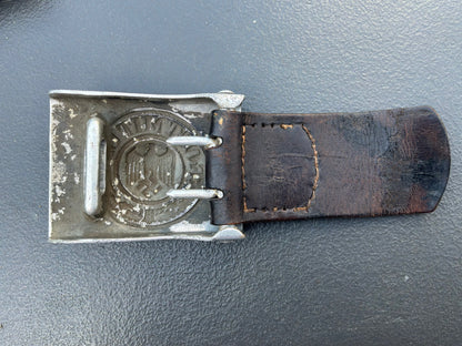 WW2 German Army (Heer) enlisted man’s and NCO’s belt buckle & leather tab.