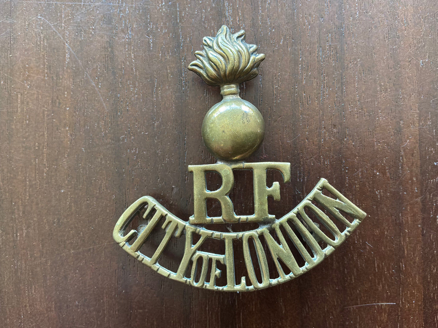 WW1 City of London, Royal Fusiliers brass shoulder title.