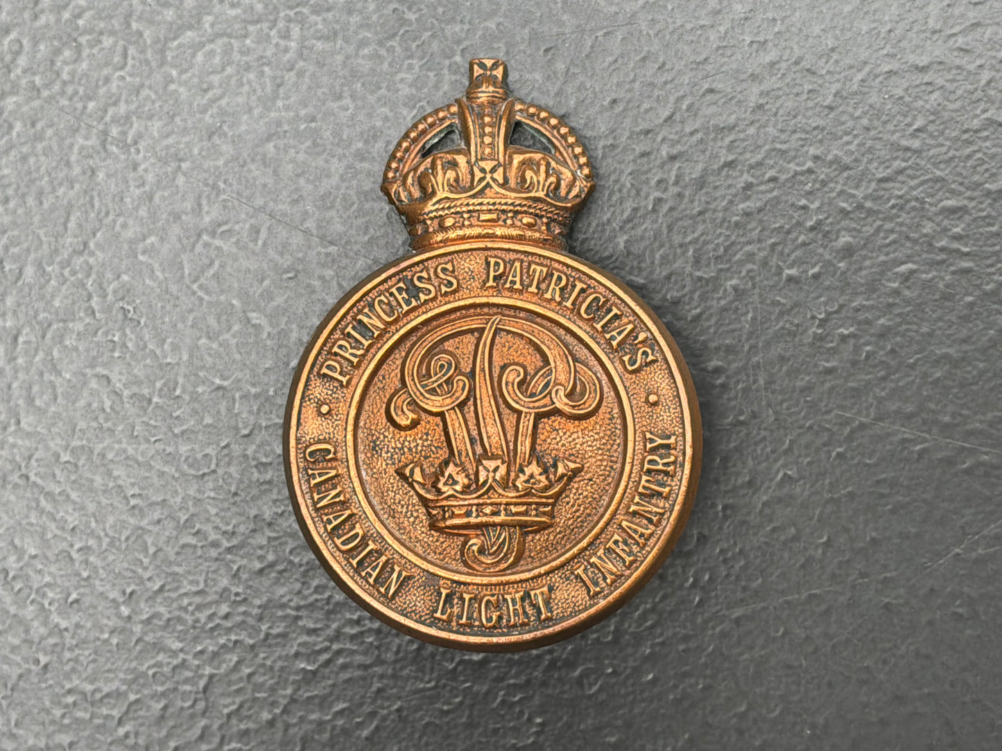 Princess Patricia's Canadian Light Infantry KC issue Cap Badge.