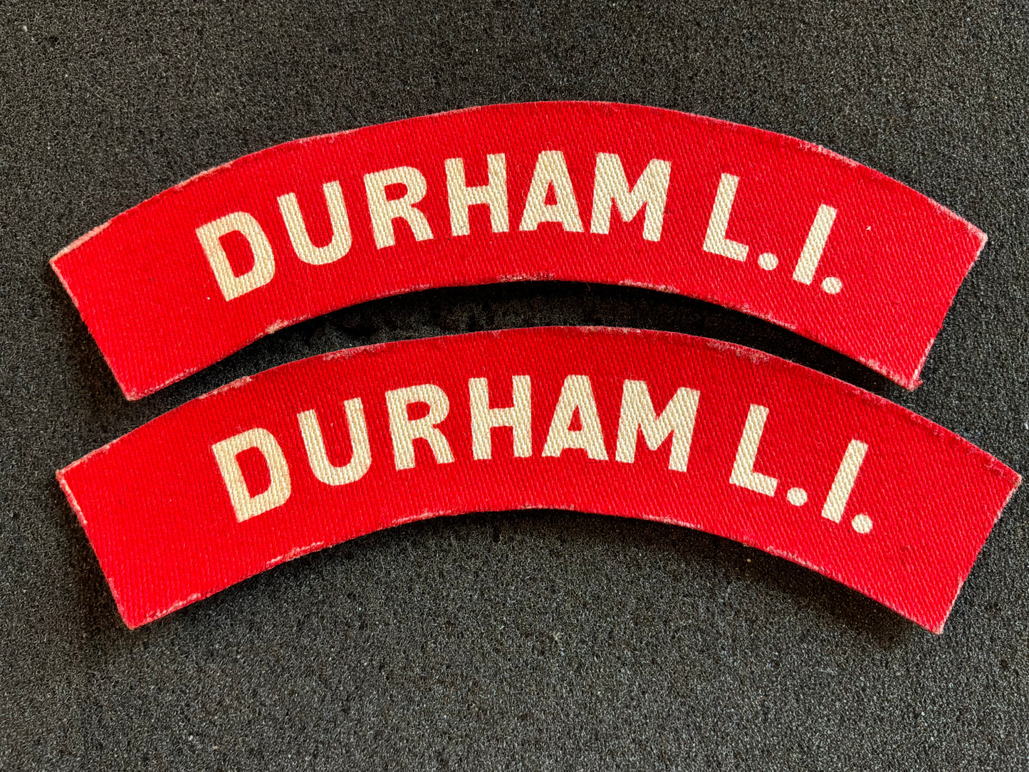 WW2 Printed DURHAM L.I shoulder titles, matching pair.