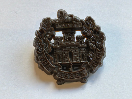 WW2 Essex Regiment plastic economy cap badge.