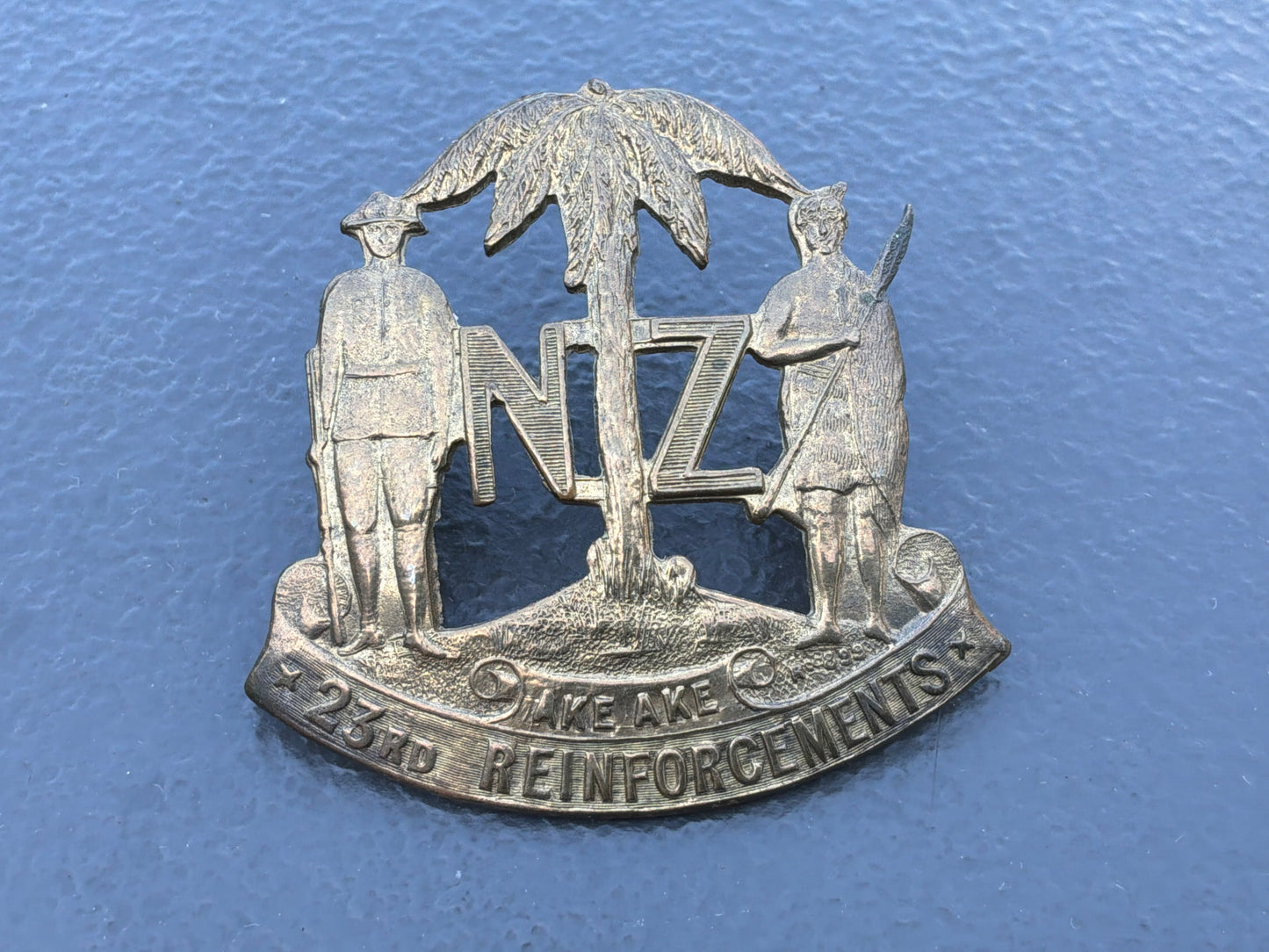 WWI New Zealand 23rd Reinforcements cap badge.