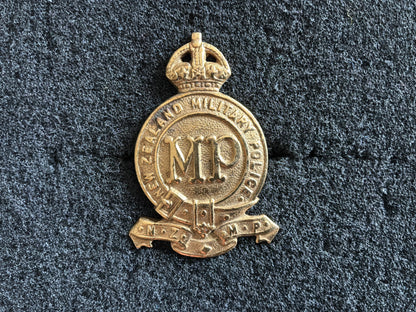 WW1/2 New Zealand Military Police ORs cap badge.