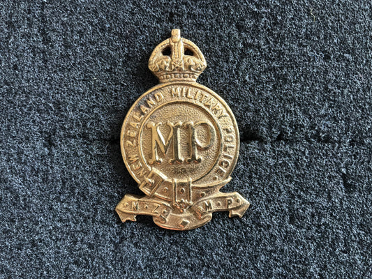 WW1/2 New Zealand Military Police ORs cap badge.