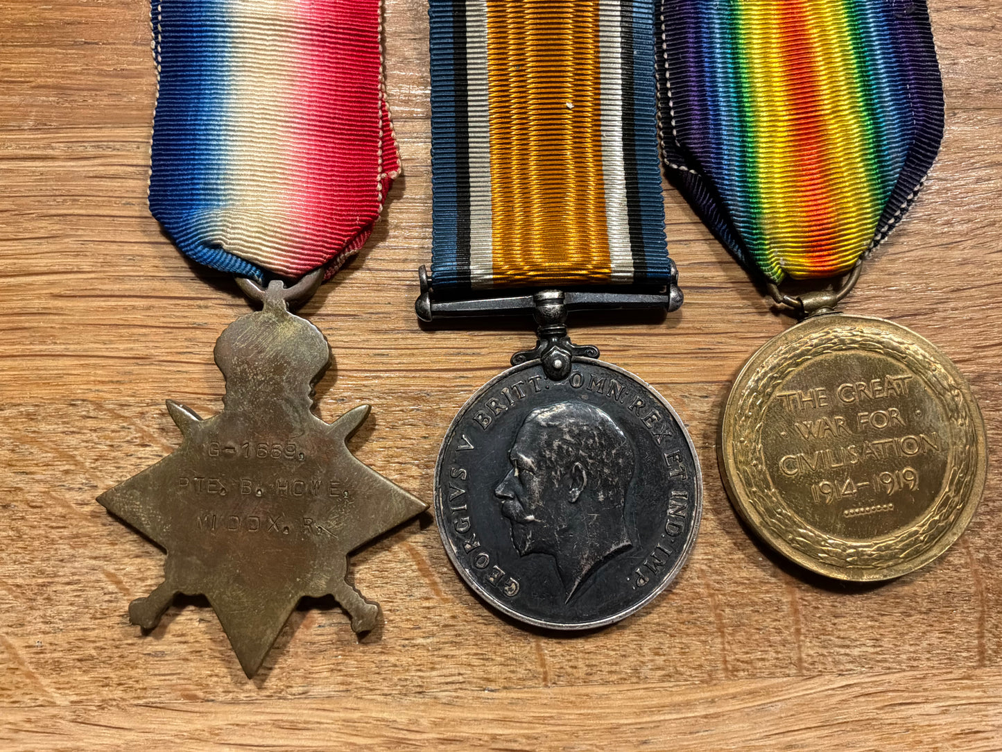 Trio to; G/1669 A/CPL Benjamin HOWE Duke of Cambridges Own (Middlesex Regt ) Football Battalion