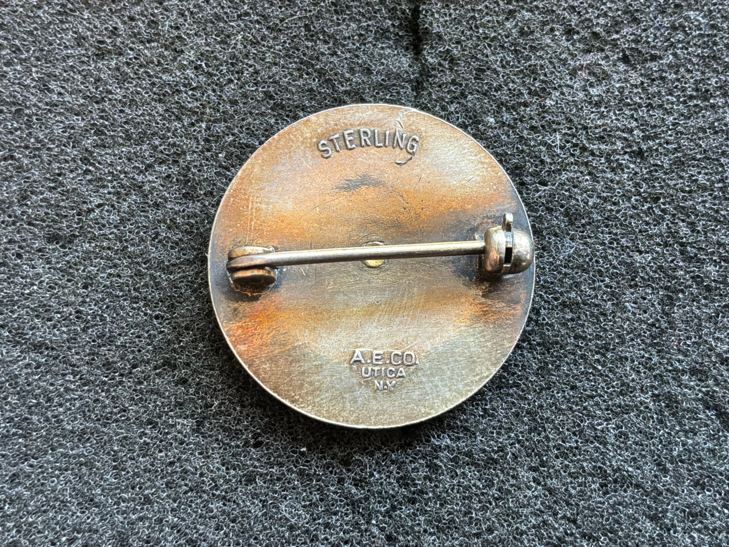 WWII-era United States Merchant Marine service lapel badge in sterling.