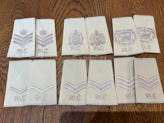 Royal Logistic Corps (RLC) rank slides in desert/tropical tan, subdued embroidery. 6 different rank pairs.