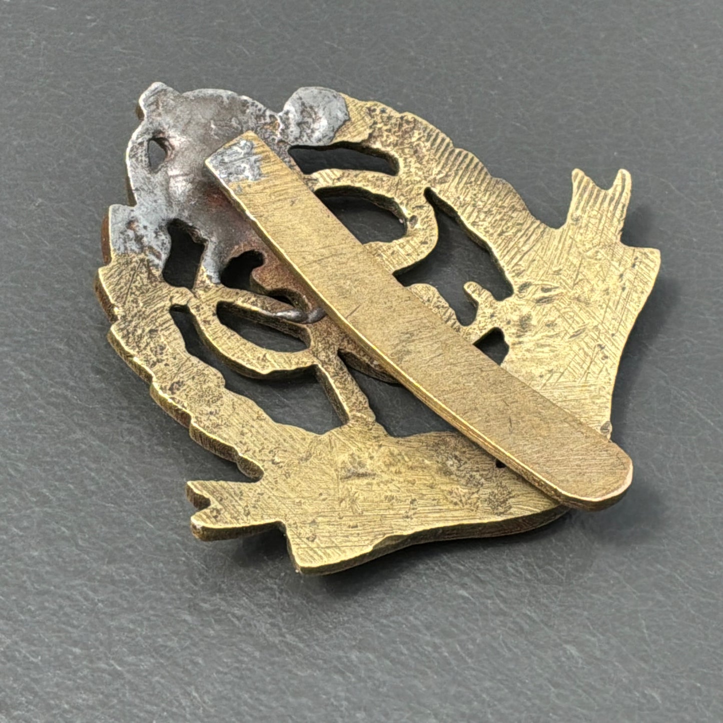 WW2 Indian/ African theatre made Royal Military Police cap badge